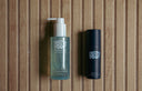 Prettyboy Moisturizer and Face Wash on a wood background