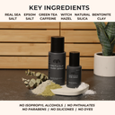 Salt and Clay surf spray bottles with key ingredients listed above on a wooden background.