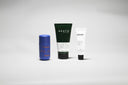 Three skincare products on a white background